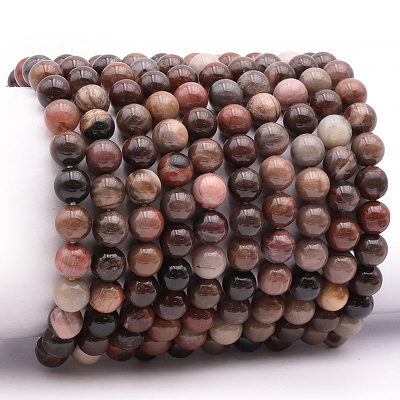 Fossilized wood bracelet United States A (7-8mm balls)