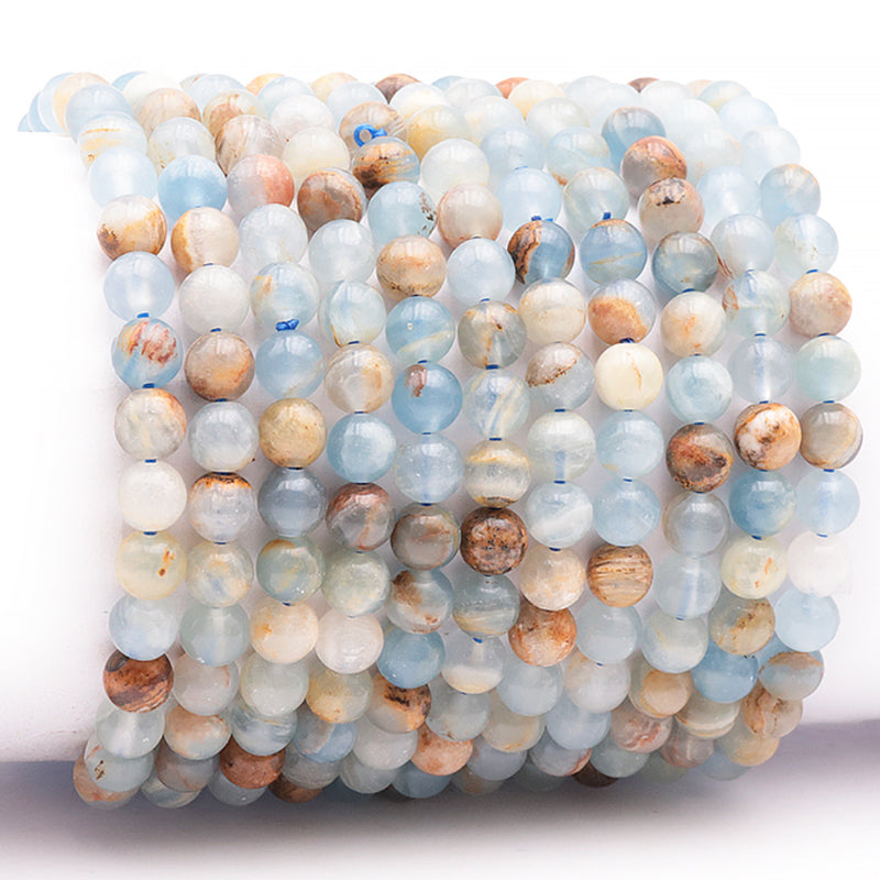 Blue calcite bracelet on Guangue Mexico AA (5-6mm balls)