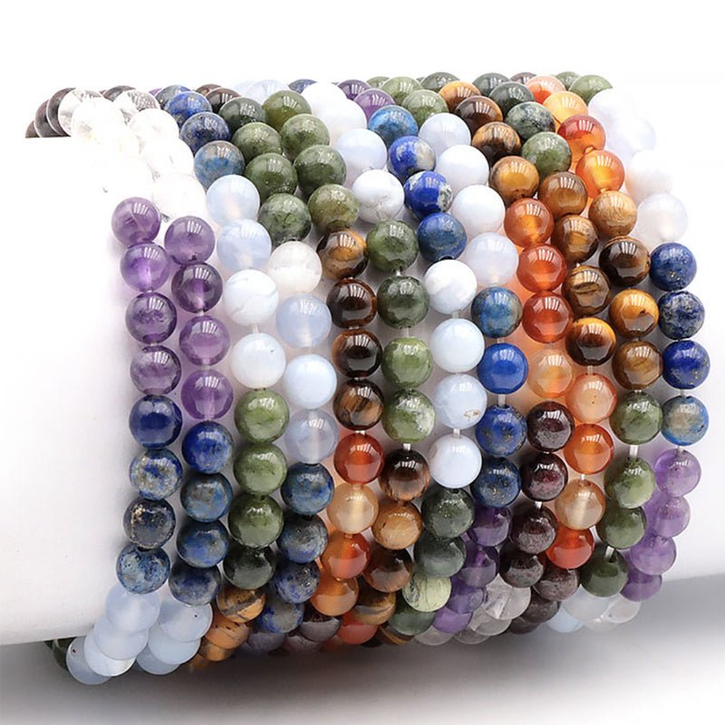 Bracelet 7 chakras modèle 4 A (boules 5 - 6mm) - La Boite à Cailloux