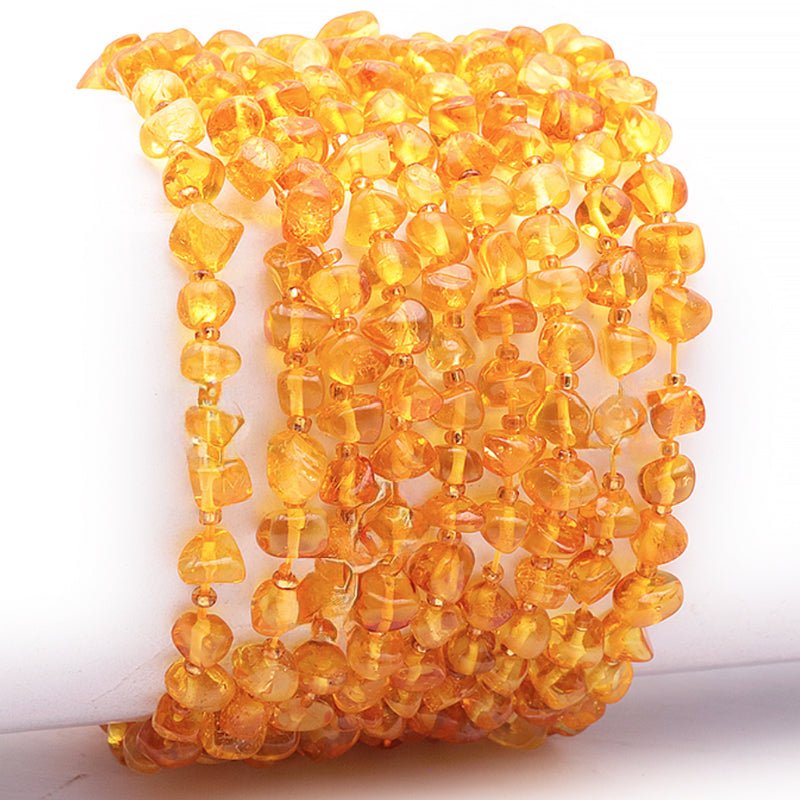 Bracelet ambre miel Lituanie A (forme naturelle 5 - 6mm) - La Boite à Cailloux