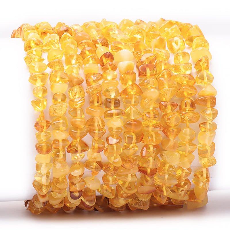Bracelet ambre miel Lituanie A+ (perles baroques) - La Boite à Cailloux