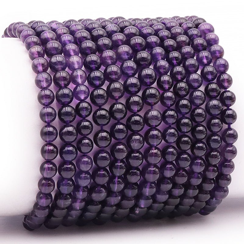 Bracelet améthyste Brésil AA (boules 5 - 6mm) - La Boite à Cailloux
