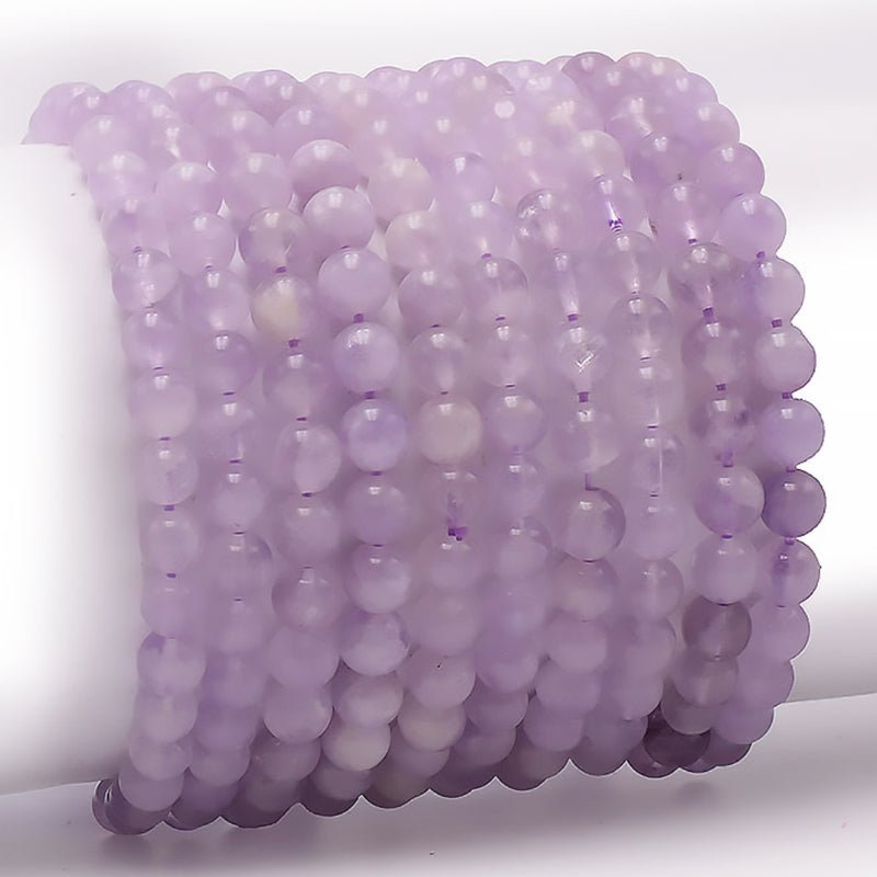 Bracelet améthyste lavande Brésil AA (boules 5 - 6mm) - La Boite à Cailloux