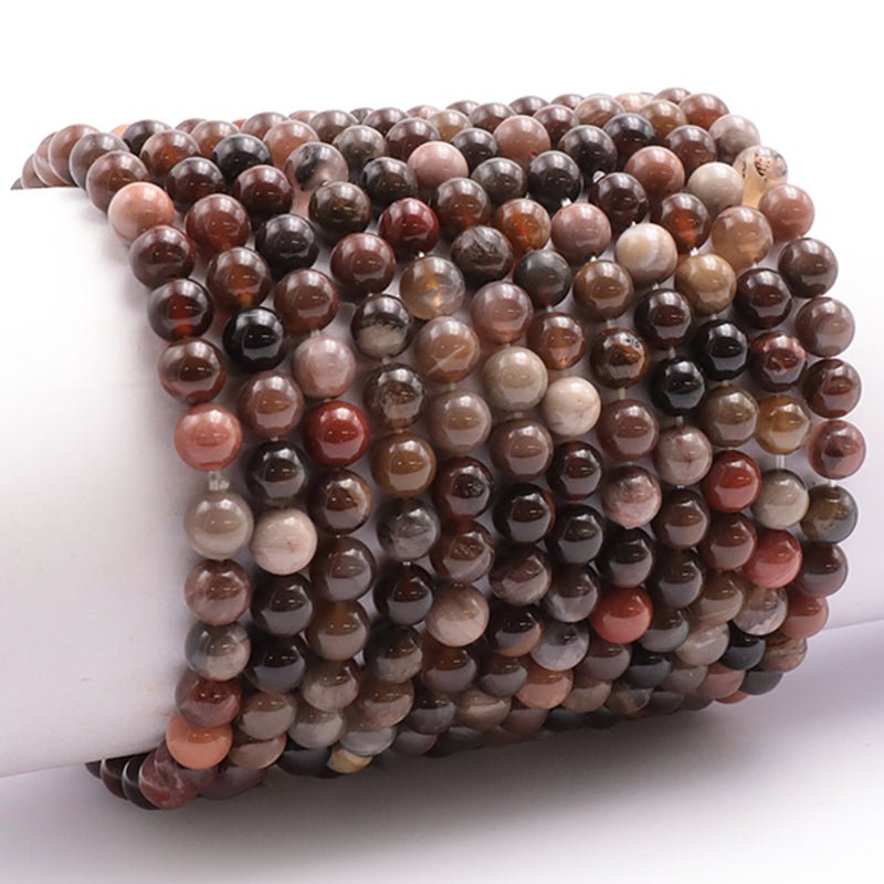 Bracelet bois fossilisé Etats - Unis A (boules 5 - 6mm) - La Boite à Cailloux
