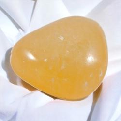 Calcite orange Mexique AA (pierre roulée)