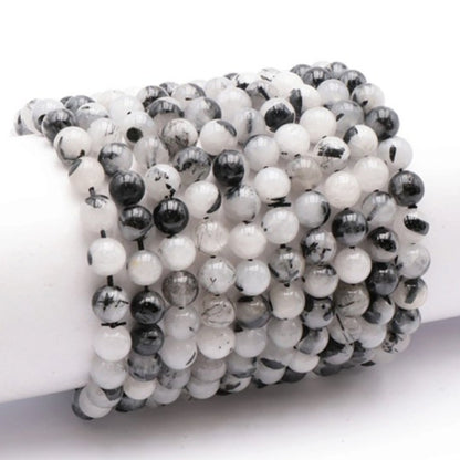 Quartz bracelet with tourmaline inclusions Brazil A (7-8mm balls)