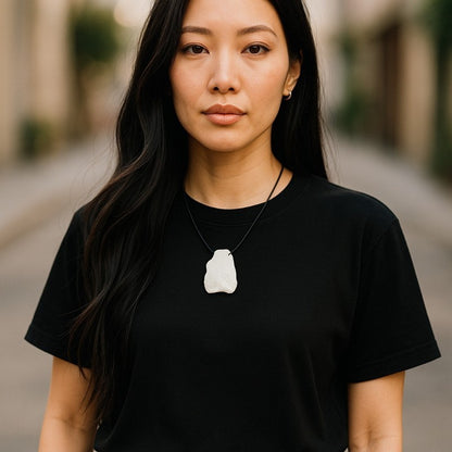 Rock crystal pendant Brazil A (raw stone) + cord