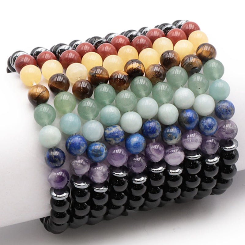 Bracelet 7 chakras onyx A (boules 7 - 8mm) - La Boite à Cailloux