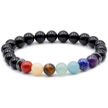Bracelet 7 chakras onyx A (boules 7 - 8mm) - La Boite à Cailloux