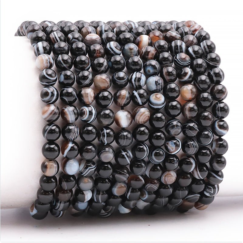 Bracelet agate oeil Brésil AAA (boules 5 - 6mm) - La Boite à Cailloux