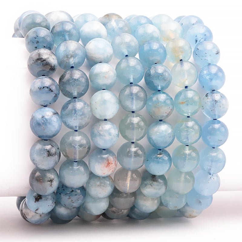 Bracelet aigue marine avec inclusions Brésil (Bahia) A (boules de 10,5 - 11,5mm) - La Boite à Cailloux
