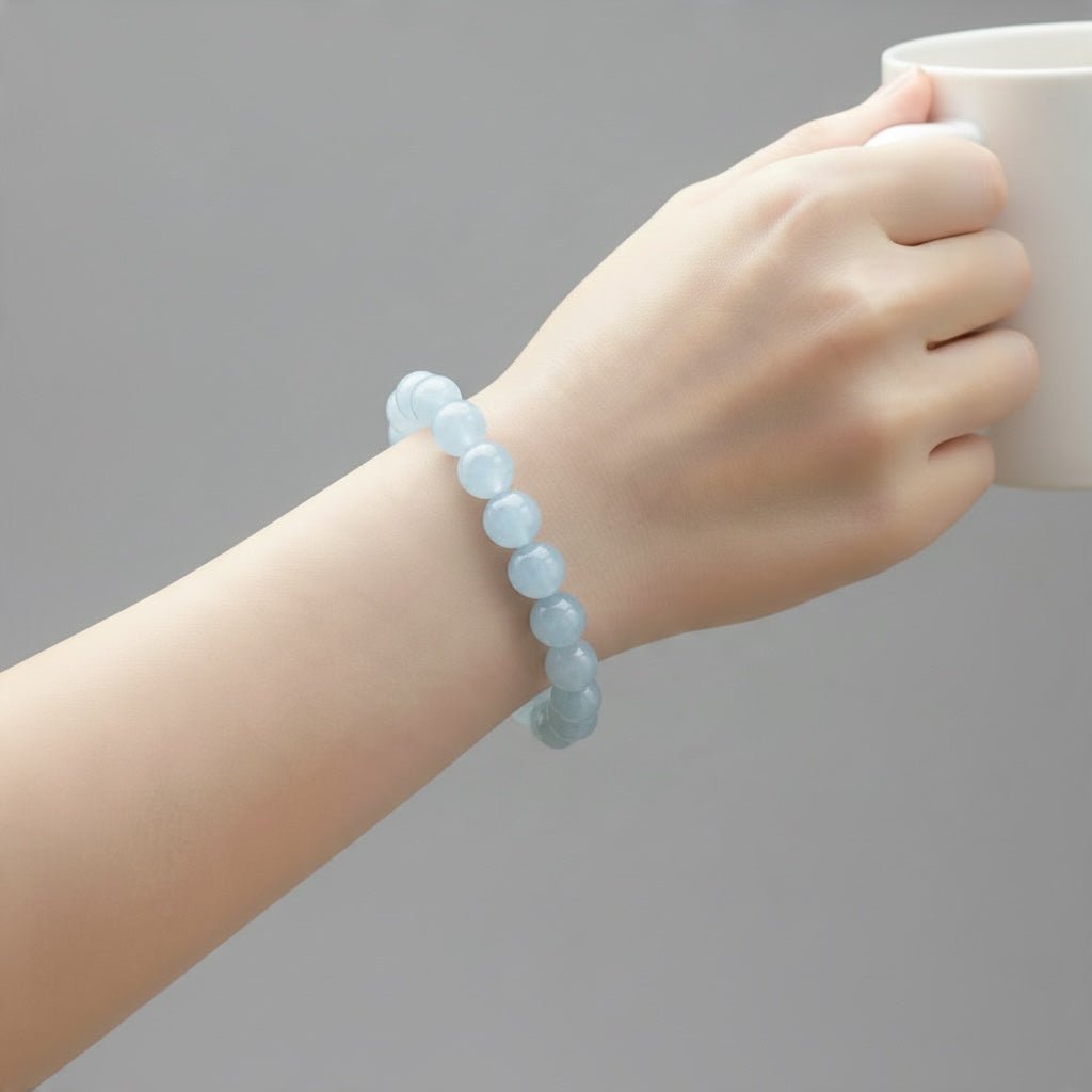 Bracelet aigue marine Brésil AA (boules 09,5-10,5mm) - La Boite à Cailloux