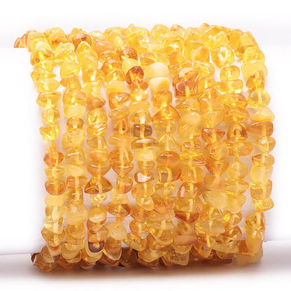 Bracelet ambre miel Lituanie A+ (perles baroques) - La Boite à Cailloux