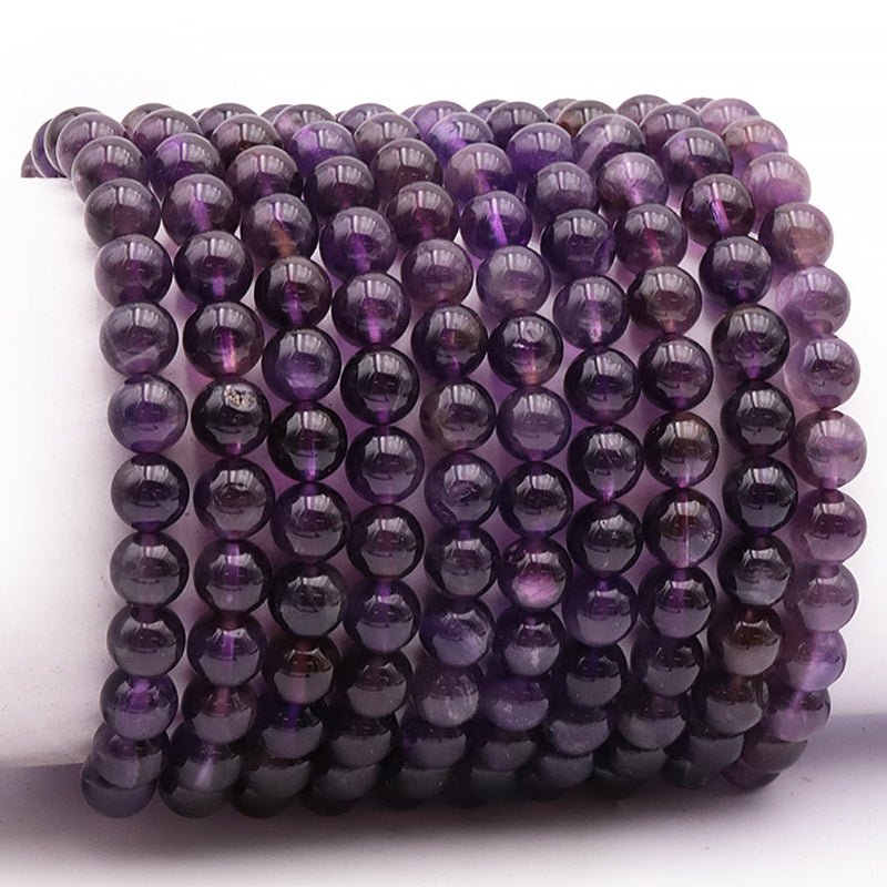 Bracelet améthyste Bolivie A (boules 7 - 8mm) - La Boite à Cailloux