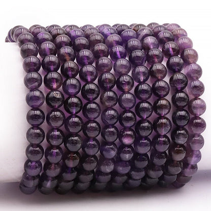 Bracelet améthyste Bolivie A (boules 7 - 8mm) - La Boite à Cailloux