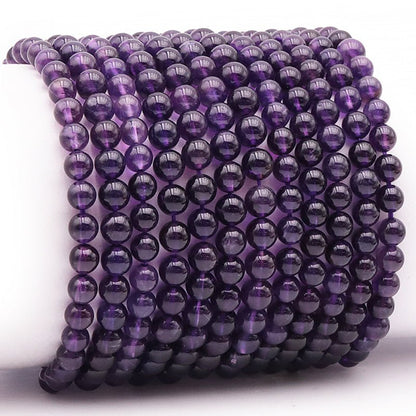 Bracelet améthyste Brésil AA (boules 5 - 6mm) - La Boite à Cailloux