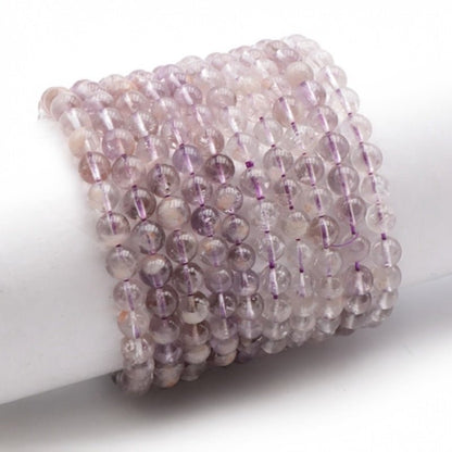 Bracelet améthyste claire Brésil AA (boules 5 - 6mm) - La Boite à Cailloux