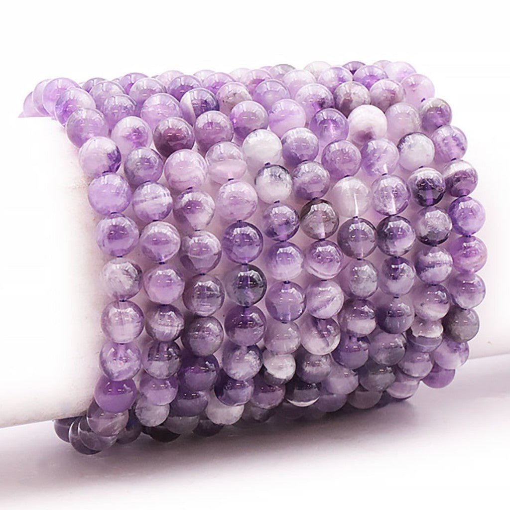 Bracelet améthyste rubanée Brésil A (boules 7 - 8mm) - Taille L - La Boite à Cailloux