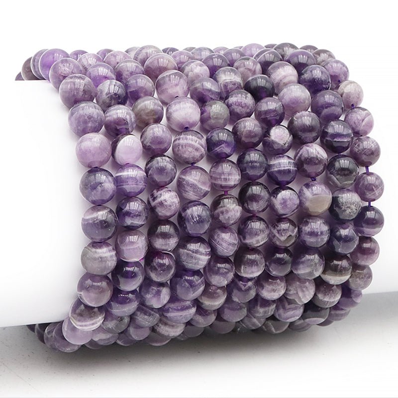 Bracelet améthyste rubanée Brésil AA (boules 7 - 8mm) - La Boite à Cailloux