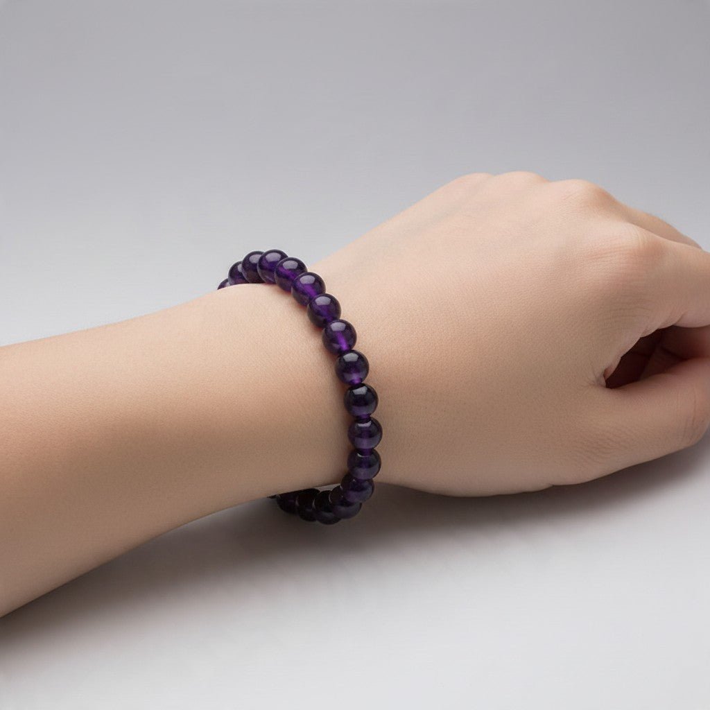 Bracelet améthyste Uruguay AA (boules 7-8mm) - La Boite à Cailloux