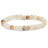 Bracelet aragonite Pérou A (boules 5 - 6mm) - La Boite à Cailloux