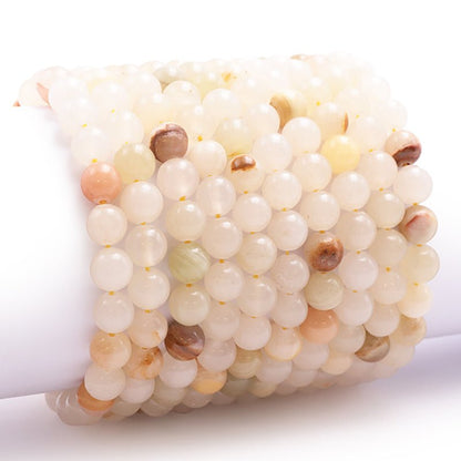 Bracelet aragonite Pérou A (boules 7 - 8mm) - La Boite à Cailloux