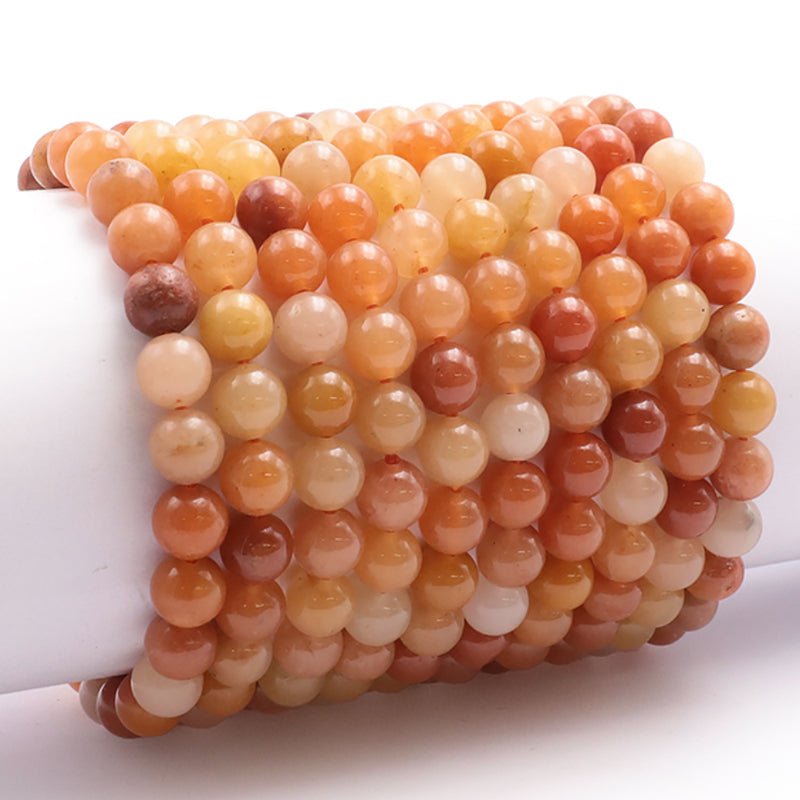 Bracelet aventurine orange Brésil A+ (boules 7 - 8mm) - La Boite à Cailloux