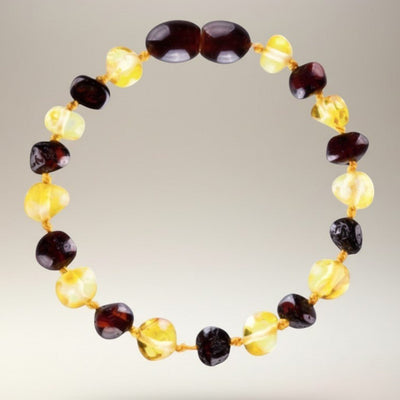 Pulsera bebé bicolor ámbar cereza y ámbar miel Lituania AA (cuentas barrocas)