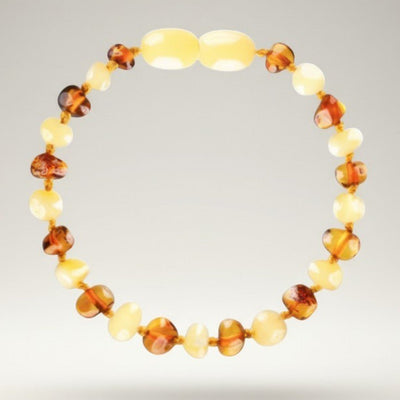 Pulsera de bebé bicolor ámbar amarillo y ámbar coñac Lituania AA (cuentas barrocas)