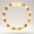 Bracelet bébé bicolore ambre jaune et ambre cognac Lituanie AA (perles baroques) - La Boite à Cailloux