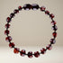 Bracelet bébé en ambre cerise Lituanie AA (perles baroques) - La Boite à Cailloux