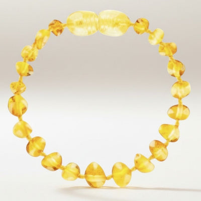 Pulsera de bebé de ámbar miel Lituania AA (cuentas barrocas)