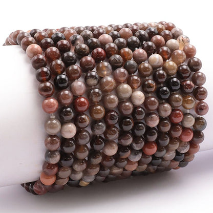 Bracelet bois fossilisé Etats - Unis A (boules 5 - 6mm) - La Boite à Cailloux