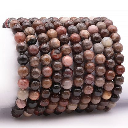 Bracelet bois fossilisé Etats - Unis A (boules 7 - 8mm) - La Boite à Cailloux