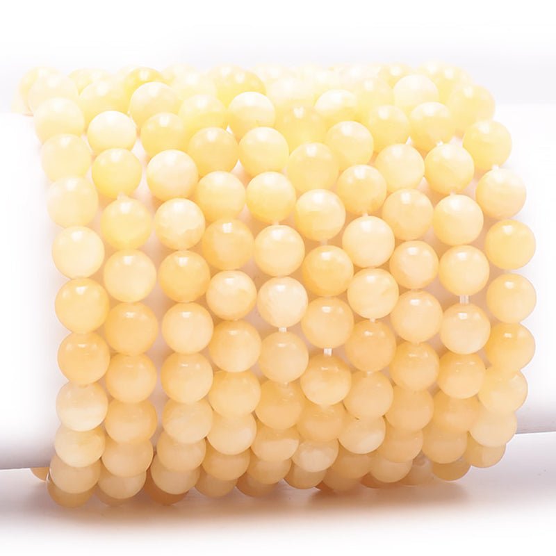 Bracelet calcite orange Mexique A (boules 7 - 8mm) - La Boite à Cailloux