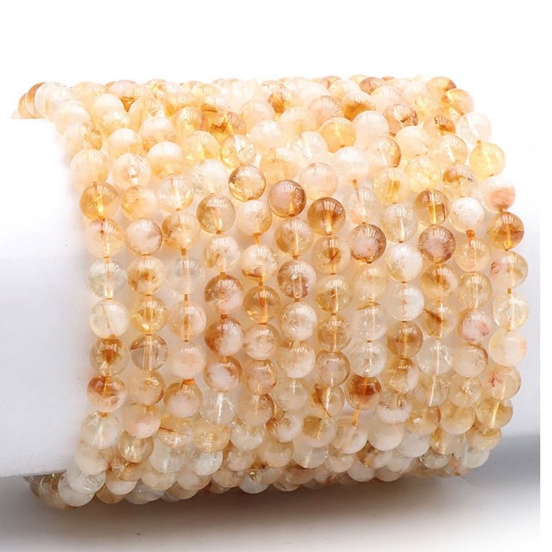 Bracelet citrine chauffée (améthyste chauffée) Brésil AA (boules 5 - 6mm) - La Boite à Cailloux