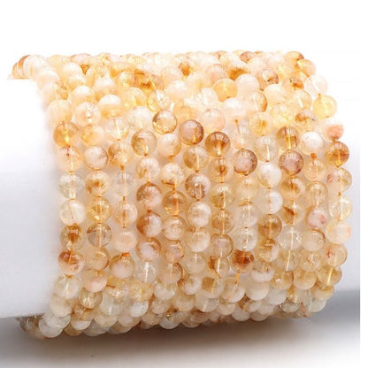 Bracelet citrine chauffée (améthyste chauffée) Brésil AA (boules 5 - 6mm) - La Boite à Cailloux