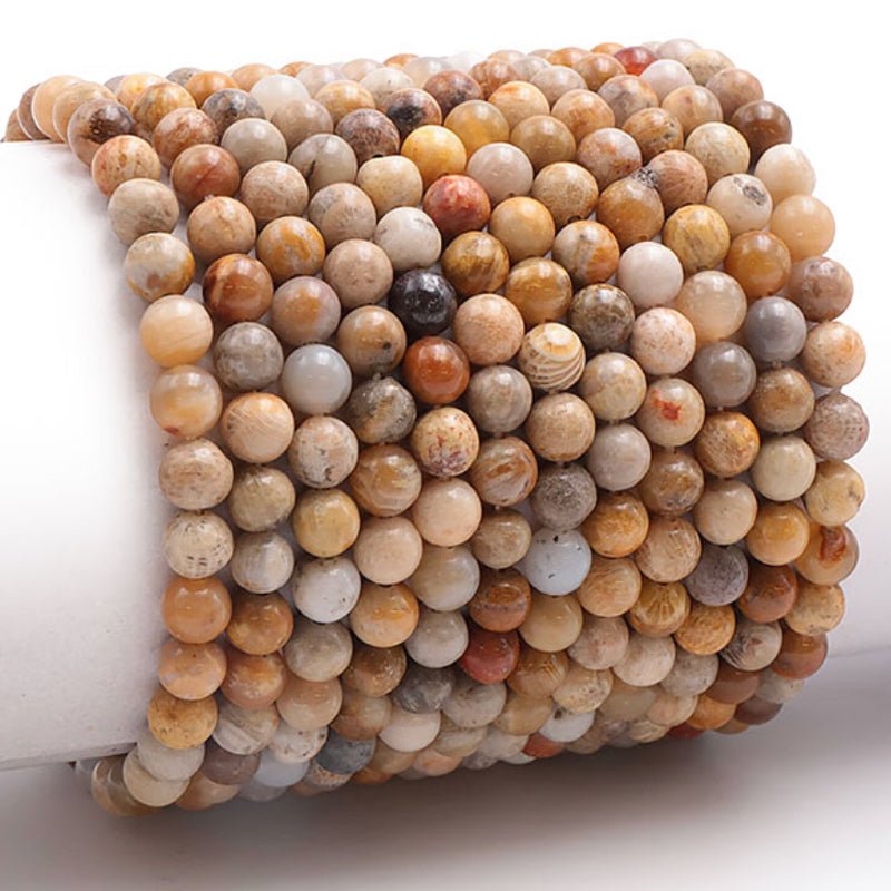 Bracelet corail fossilisé Brésil A (boules 5 - 6mm) - La Boite à Cailloux