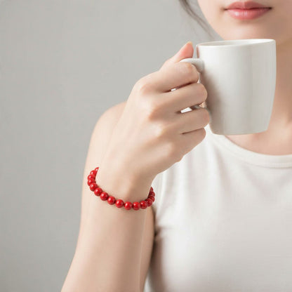Bracelet corail teinté rouge Brésil A (boules 7-8mm) - La Boite à Cailloux