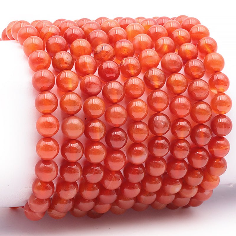 Bracelet cornaline chauffée Brésil A (boules 7 - 8mm) - La Boite à Cailloux