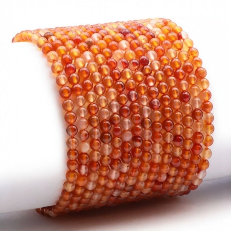 Bracelet cornaline naturelle Brésil A (boules 3 - 4mm) - La Boite à Cailloux