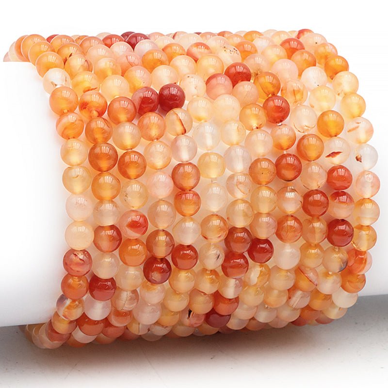 Bracelet cornaline naturelle Brésil A (boules 5 - 6mm) - La Boite à Cailloux