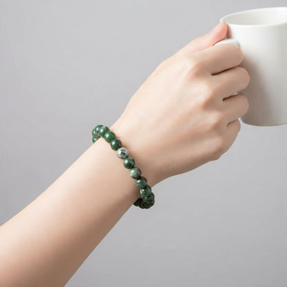 Bracelet diopside vert Etats-Unis AB (boules 7-8mm) - La Boite à Cailloux