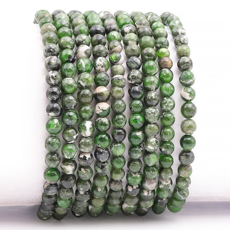 Bracelet diopside Vert sur gangue Etats - Unis AA (boules 4,5 - 5,5mm) - La Boite à Cailloux