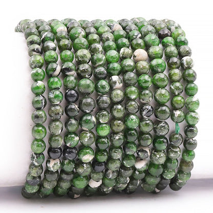 Bracelet diopside Vert sur gangue Etats - Unis AA (boules 5,5 - 6,5mm) - La Boite à Cailloux