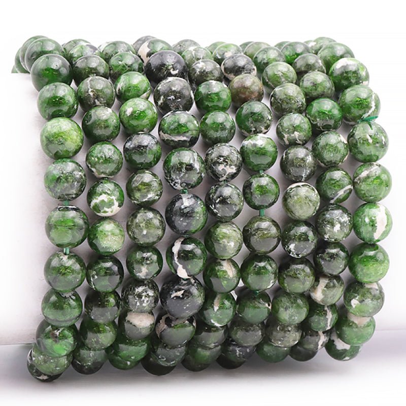 Bracelet diopside Vert sur gangue Etats - Unis AA (boules 8,5 - 9,5mm) - La Boite à Cailloux