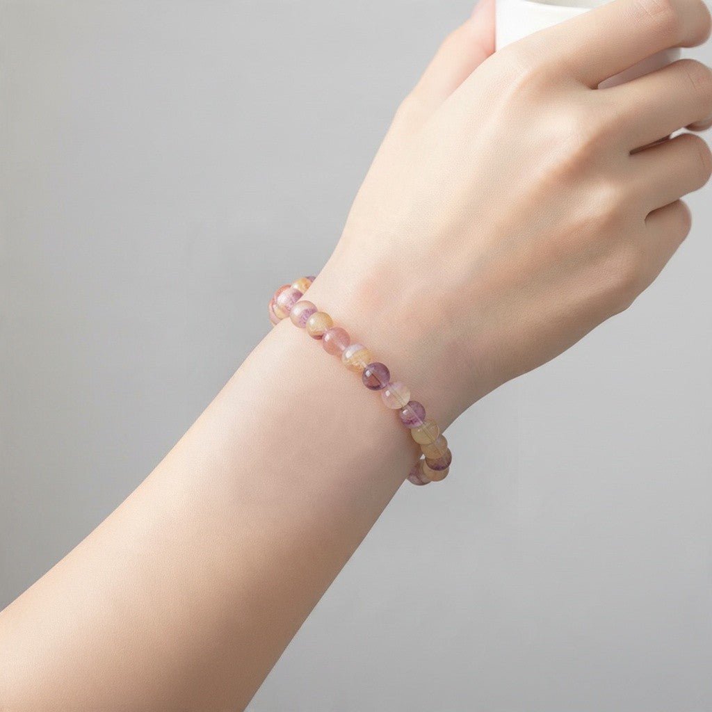 Bracelet fluorine jaune violette Chine AA+ (boules 7,5-8,5mm) - La Boite à Cailloux
