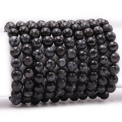 Bracelet Gabbro Madagascar A+ (Merlinite mystique) boules 10mm - La Boite à Cailloux