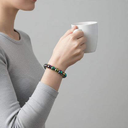 Bracelet Hématite arc en ciel Chine A (boules de 10mm) - La Boite à Cailloux