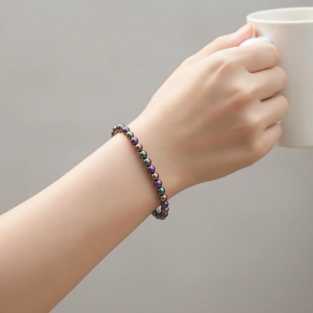Bracelet Hématite arc en ciel Chine A (boules de 5-6mm) - La Boite à Cailloux